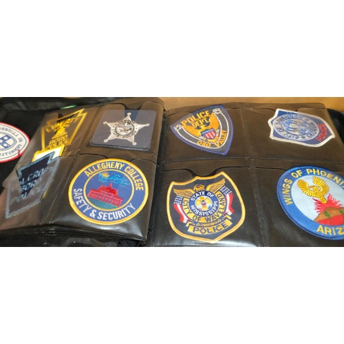 102 - US Police cloth badges, a collection of approx. 200 in album.