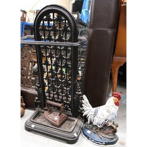 112 - A Victorian cast iron stick stand in black and chicken door stop