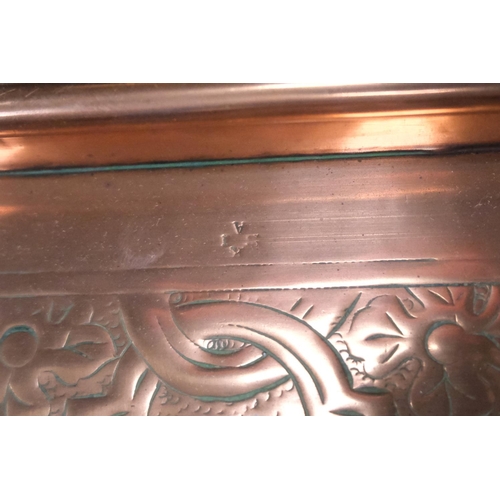 167 - A rectangular copper tray with all over interlocking floral motifs, by the 