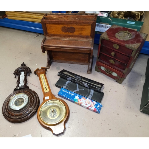 180 - A piano shaped letter rack/ desk organiser, two barometers, a Chinese Jewellery box etc 