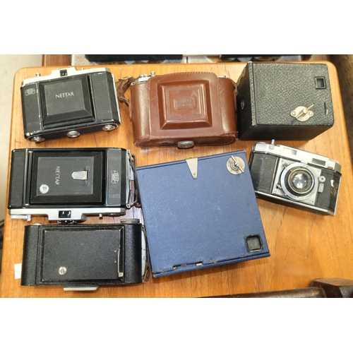 324E - A selection of vintage cameras, SLR and others.