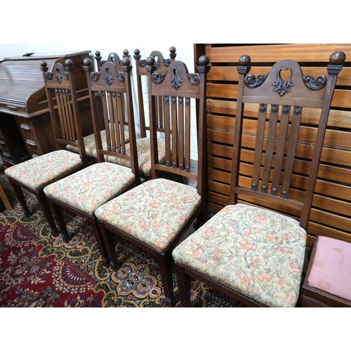 895 - A set of 6 period style mahogany high back dining chairs with carved top rails, floral seat and squa... 