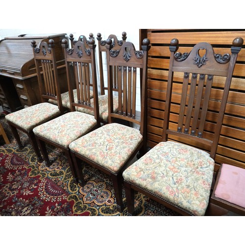 895 - A set of 6 period style mahogany high back dining chairs with carved top rails, floral seat and squa... 