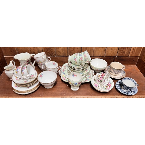 425A - A selection of Royal Albert teaware, Japanese and other cups and saucers.