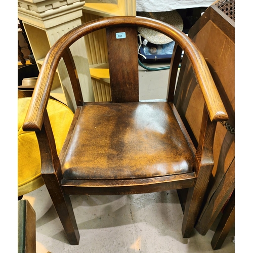 884 - An oak smokers bow chair and a stained wood lamp.