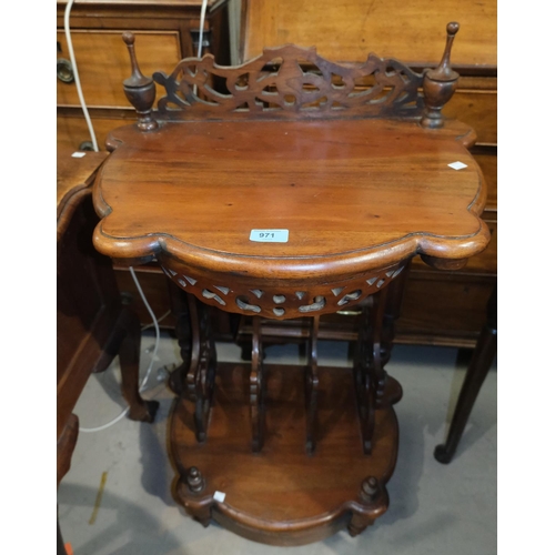 971 - A Victorian mahogany whatnot with pierced rack beneath and a mahogany table.