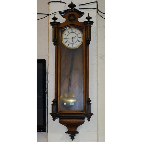 981 - A 19th Century walnut Vienna wall clock with three ebonised finials and ebonised mouldings, single w... 