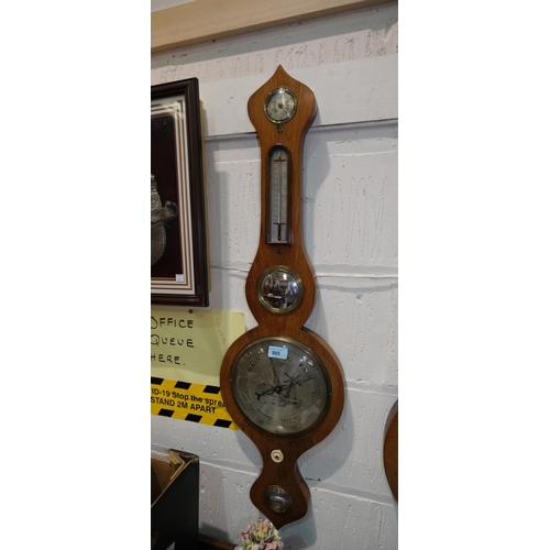 985 - A 19th century walnut cased mercury column barometer with engraved silver scale level and thermomete... 