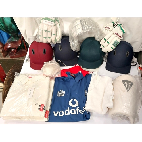 201 - A box of various sports kit, helmets, shirts etc.