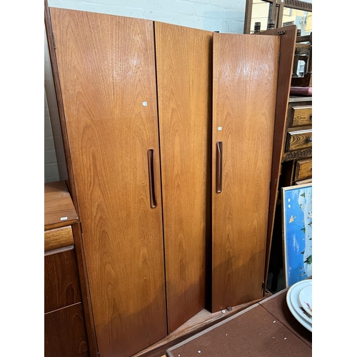 960A - A G-Plan 1970's teak wardrobe with inset handles