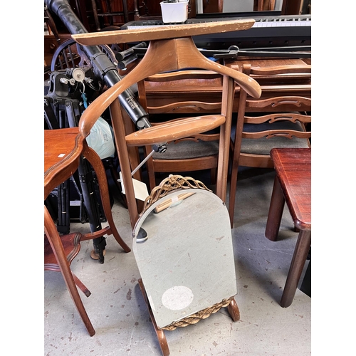 983 - A valet stand; an arch top gilt framed hall mirror.