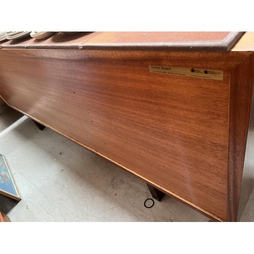 899 - A Martin Hall for Gordon Russell: A Marwood low-line rosewood sideboard with 4 cupboards and 4 drawe... 