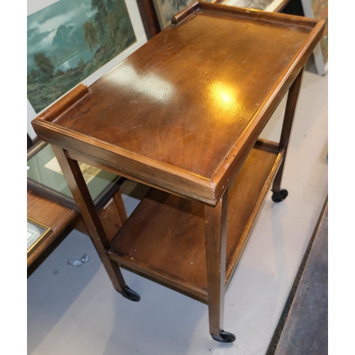 881 - An oak nest of three occasion tables and an occasion drop leaf table and a card table trolley.