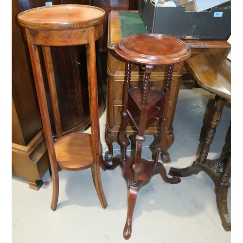 878A - A mahogany reproduction wing stand with drawers bellow, a mahogany plant stand and a table