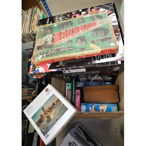 108 - A collection of vintage board games, unopened jigsaw puzzles etc.