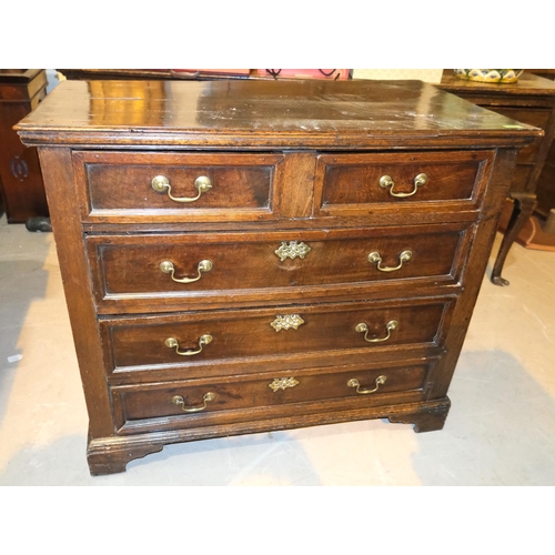 1019 - A Georgian oak chest of 3 long and 2 short drawers.