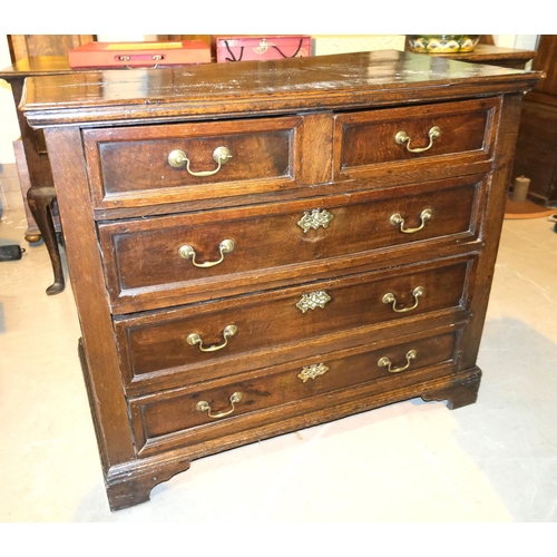 1019 - A Georgian oak chest of 3 long and 2 short drawers.