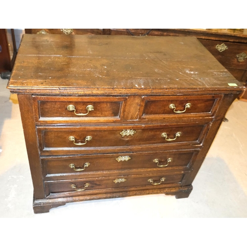 1019 - A Georgian oak chest of 3 long and 2 short drawers.