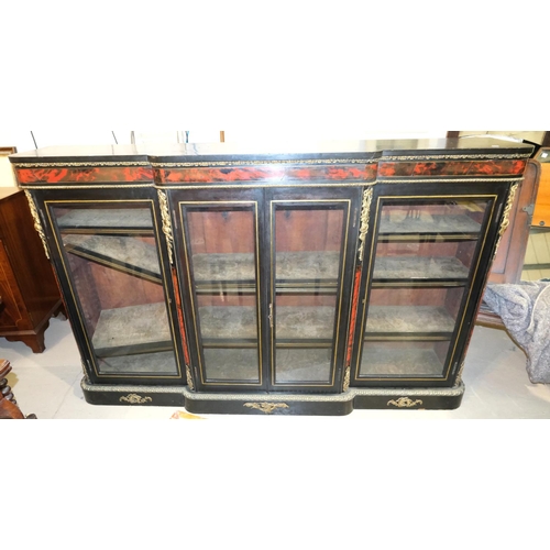 1024 - A large 19th Century ebonised credenza with boule work, brass fittings, four glazed doors with brass... 