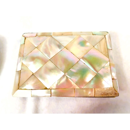 104 - A Victorian mother of pearl card case, 14cm and a similar with engraved decoration.