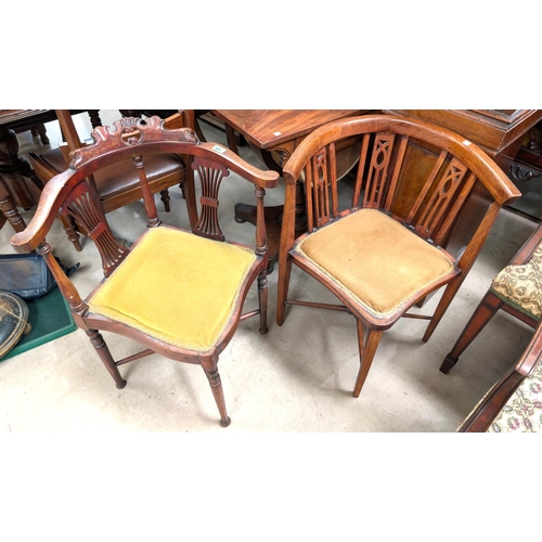 1044 - Two inlaid mahogany armchairs with pierced supports.