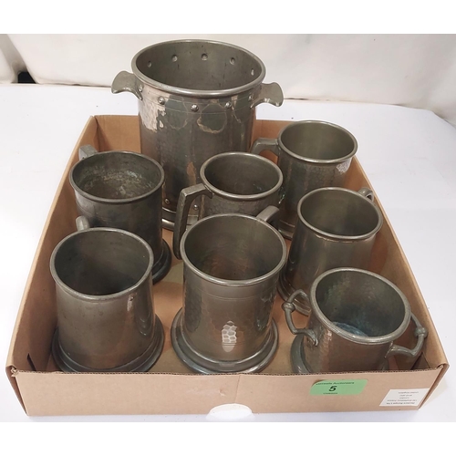 5 - A planished pewter siphon/bottle stand and 6 small pewter tankards, 3 with glass bottoms.