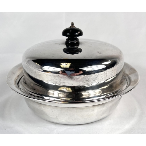 684 - A hallmarked silver muffin dish with ebonized handle, diameter 18cm, Sheffield 1938, maker James Dix... 