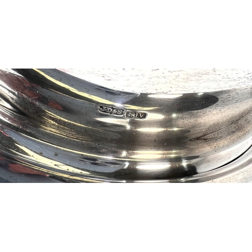 684 - A hallmarked silver muffin dish with ebonized handle, diameter 18cm, Sheffield 1938, maker James Dix... 