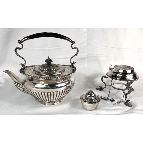 685 - A Georgian style spirit kettle of oval form with gadrooned rim and lower section, the burner base wi... 