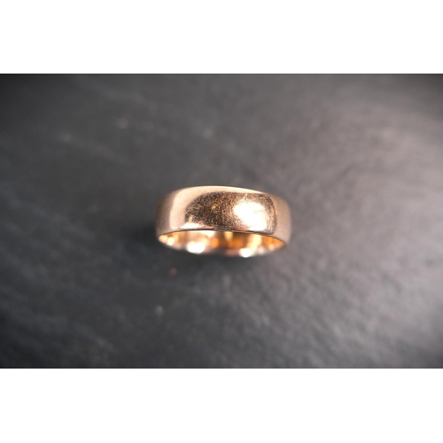 687 - A wide barrel shaped 9 ct hallmarked gold wedding ring, 4.4 gms, size 'P' - 'Q'.