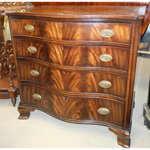 993 - A mahogany serpentine fronted bachelors chest with four long drawers 80x84x52cm.