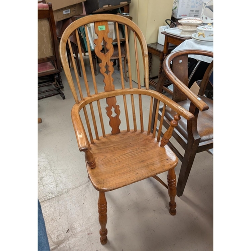 922 - Two Lloyd Loom white linen baskets; an Edwardian satin walnut towel rail