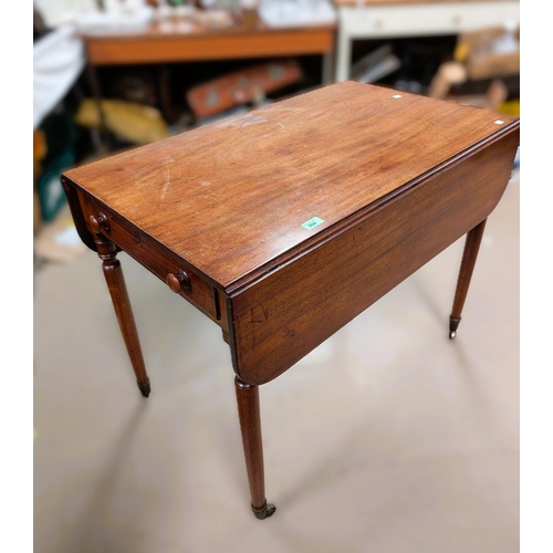 994 - A 19th Century mahogany oval table with turned supports. 92x73cm; a Georgian mahogany Pembroke ... 