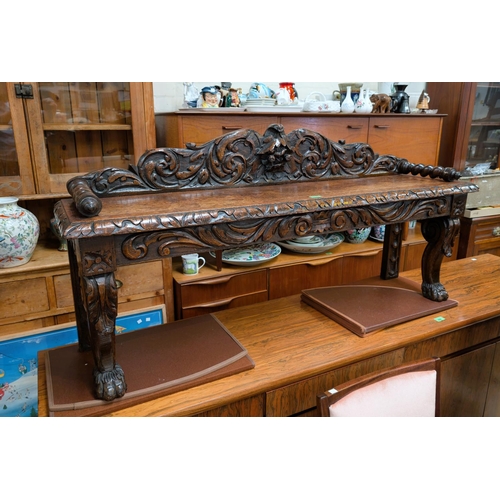 1020 - A Victorian Gothic carved bench seat.