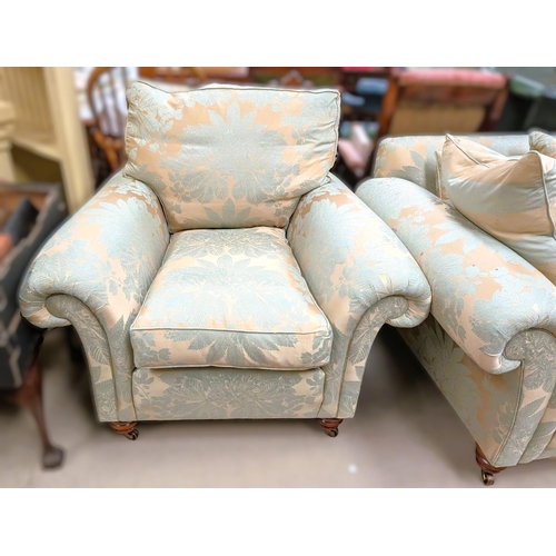 1054 - Duresta hand made armchair in sage and gilt upholstery.