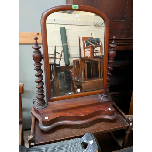 1007 - A Victorian mahogany freestanding dressing table mirror with barley twist side columns.