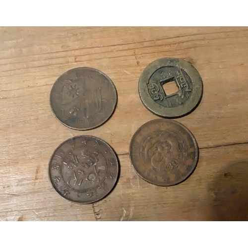 216A - A small selection of Chinese coins.