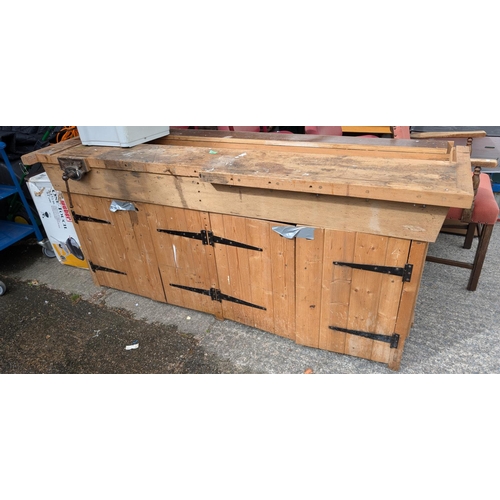 41 - A large pine workbench with vice.