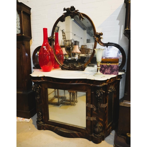 995 - A Victorian simulated zebra wood mirror back chiffonier, the raised oval back with carved fruit and ... 