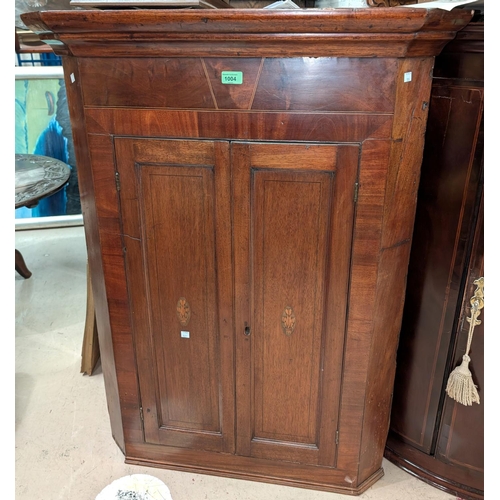 1004 - A Georgian straight front mahogany two-door corner cupboard with ebony and boxwood and Sheraton styl... 