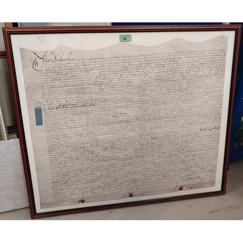 42 - A framed and sealed vellum document with lengthy written passage and other pictures and prints; a 19... 