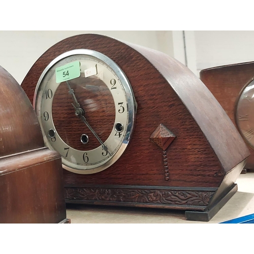 54 - Three mid 20th Century arch top mantle clocks, one timepiece chiming.