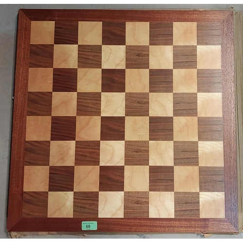 69 - A coffee table chess set with Medieval style ebony and ivory coloured pieces.