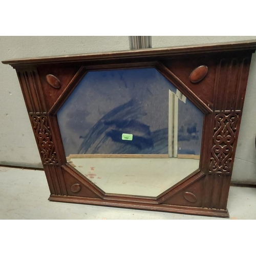 162 - An octagonal art deco wall mirror and another oval shaped 