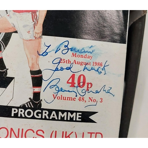 25B - A collection of Manchester United programmes, pictures etc, some with signatures.