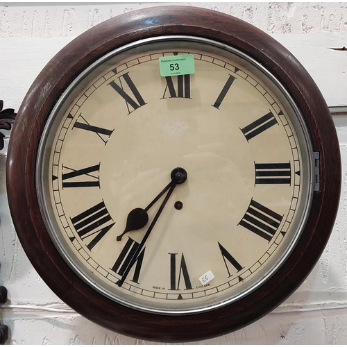 53 - A late 19th Century/early 20th Century circular oak wall clock with time piece movement.