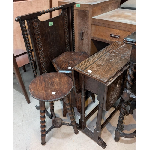 992 - A 1930's oak fire screen, barley twist lamp and three oak tables, an oak drop-leaf table.