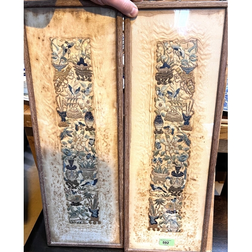 618 - A pair of Chinese embroidered sleeve panels (damp stained), 57x18cm overall, a pair of embroidered p... 