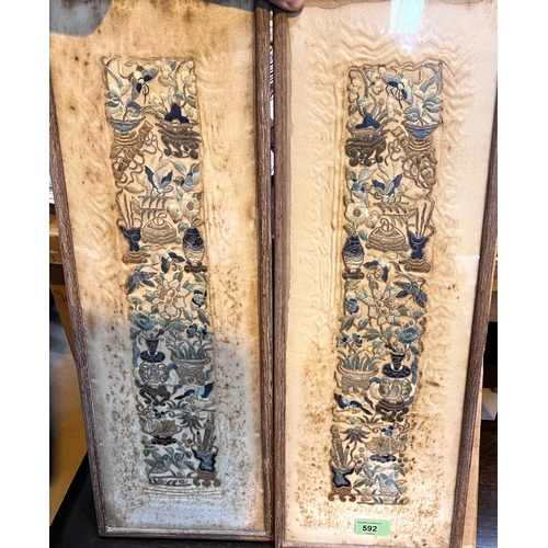 618 - A pair of Chinese embroidered sleeve panels (damp stained), 57x18cm overall, a pair of embroidered p... 