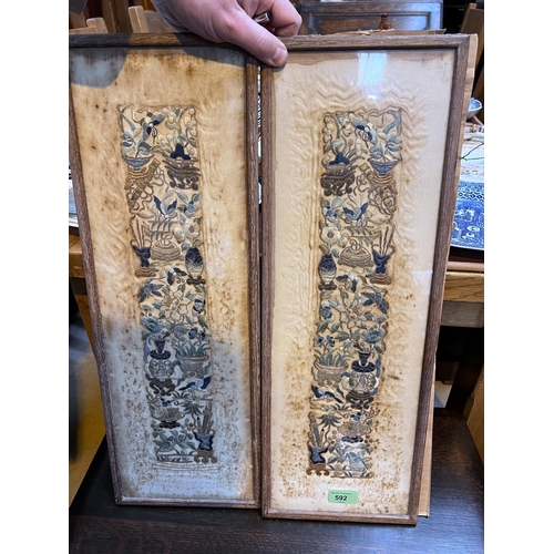 618 - A pair of Chinese embroidered sleeve panels (damp stained), 57x18cm overall, a pair of embroidered p... 